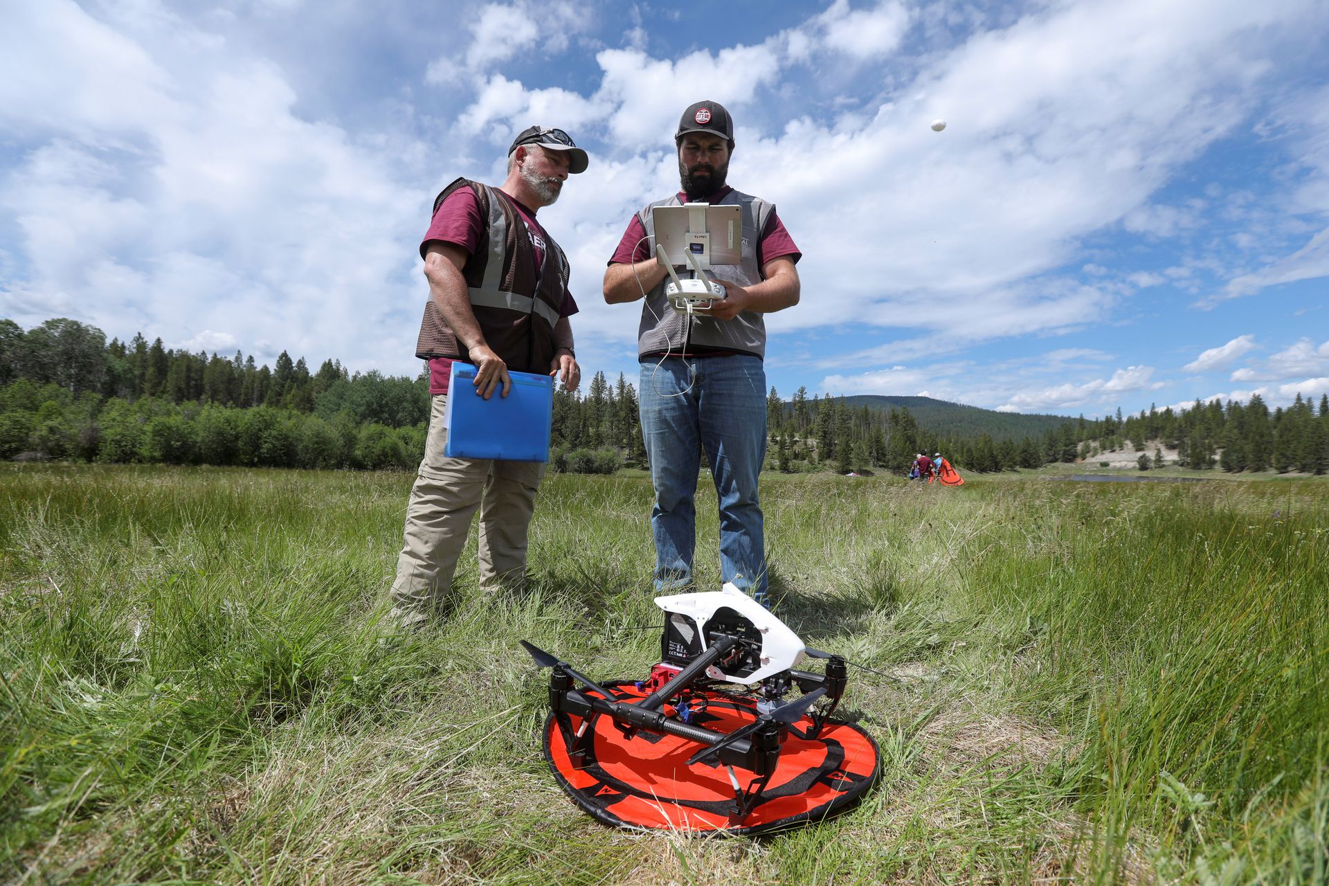 Chief pilot Bart Bauer and operator Jim Seielstad of Autonomous Aerial Systems Office at the University of Montana