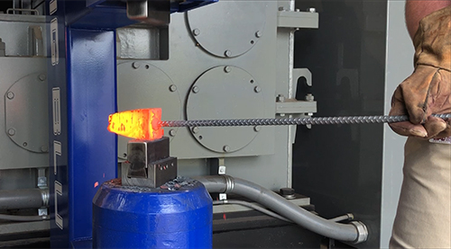 A pneumatic power hammer is among the forging capabilities at the Edwards Building, allowing for research on novel wrought alloys.