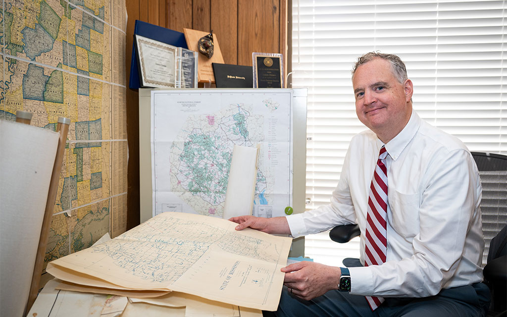 Jim Giesen at desk